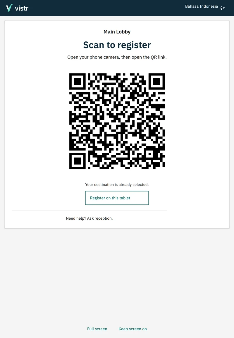 The tablet screen with a large QR code and direct registration option.