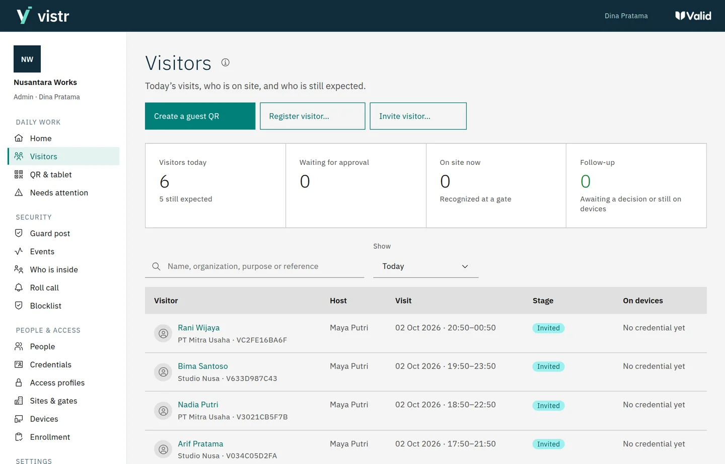 Visitor reception in Vistr, with a staff workspace and mobile guest registration.